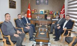 Özkaya'dan MHP İl Başkanı Kahveci'ye Tebrik Ziyareti
